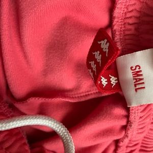 Neon pink Kappa pants